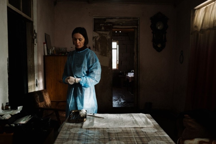 <em>April</em>, red. Dee Kulumbegashvili